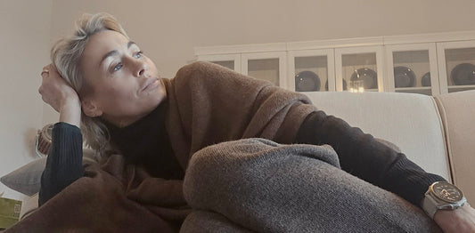 woman on sofa wearing alpaca clothing